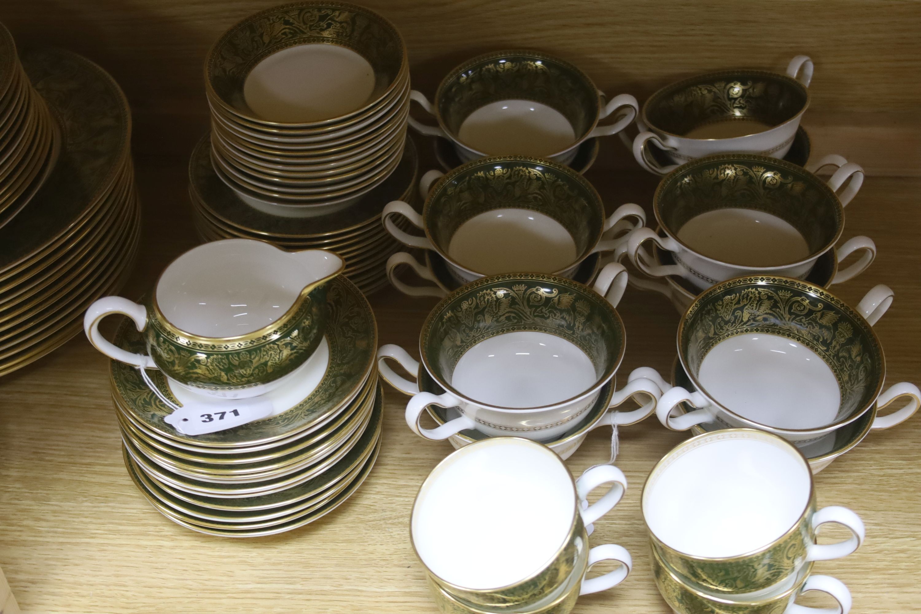 A Wedgwood Green Florentine pattern bone china part dinner and tea service, 110 pieces for a 12 place setting
